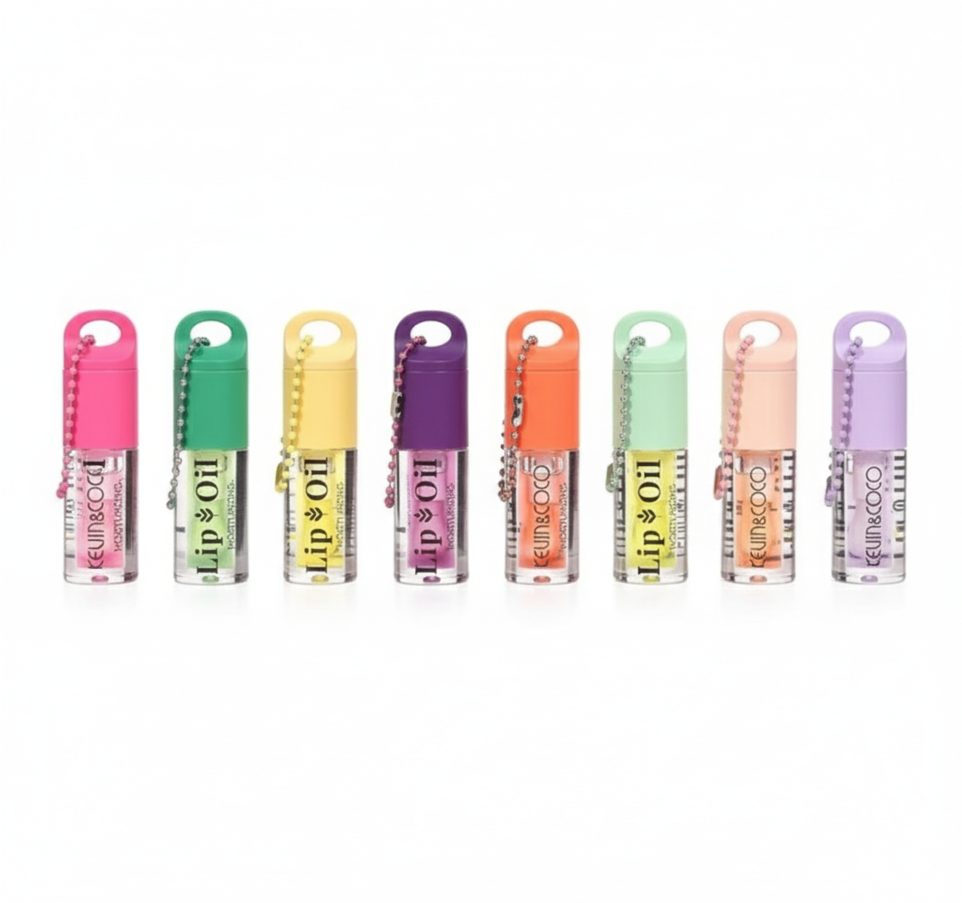 10 Kevin and Coco lip oils arranged in a line