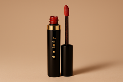 Luxury Abundantly Beautiful Lip Gloss with light brown background